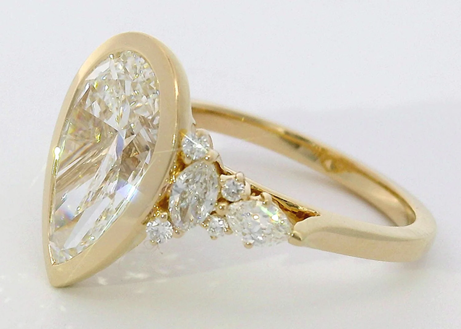 Finished pear-shape diamond engagement ring, design DAC-EN-0226, handcrafted by Diamonds Above