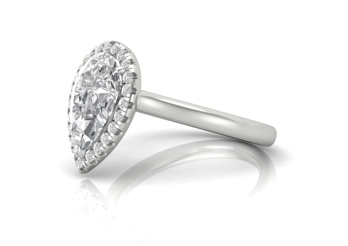 CAD render of pear-shape diamond with diamond halo in platinum solitaire band