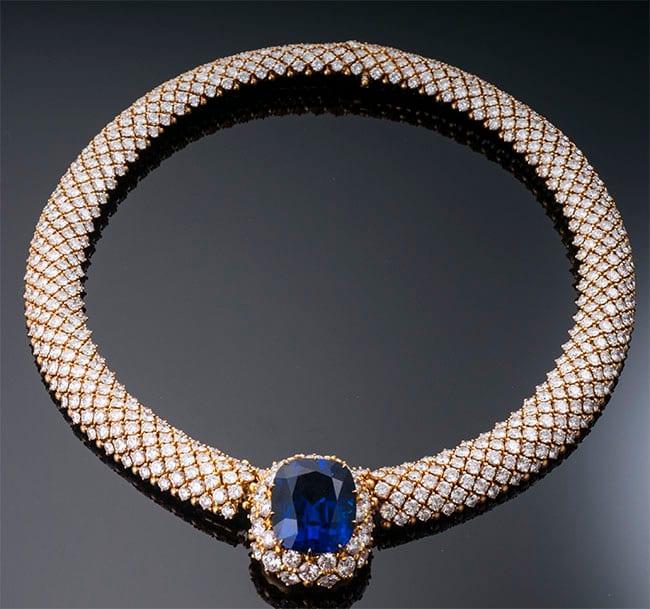 Yellow gold diamond-pavé necklace with cushion tanzanite pendant and diamond halo